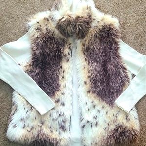 Furry vest. Reversable. Fake fur. Size m/l